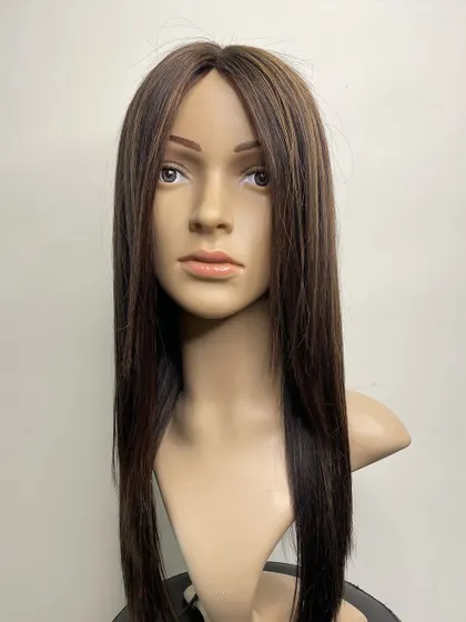 A full view of a long, highlighted silk wig. This piece combines the most natural-looking scalp with beautiful, high-quality hair for a truly premium experience.