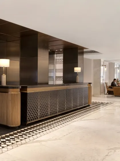 The completed reception at the Soaltee Hotel offers a contemporary reinterpretation of Nepal. The design guides guests through a journey of shifting tones and textures, establishing a sophisticated and welcoming atmosphere that is deeply connected to its location.