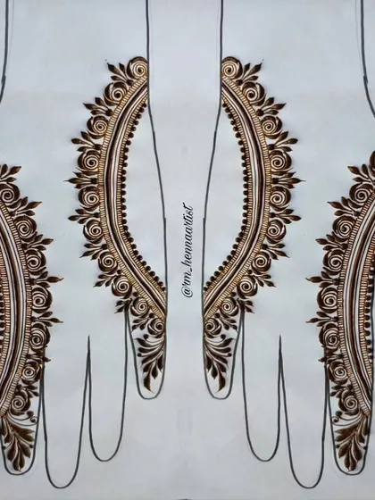 The finished Gulf mehendi designs from the tutorial. Practicing on templates like this allows you to perfect your symmetry and line work before applying the henna to both hands.