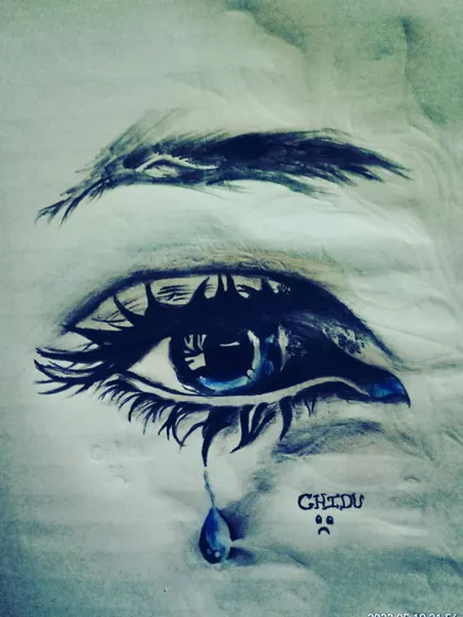 An expressive drawing of a crying eye, created with charcoal and a touch of blue color for the tear. This piece is about capturing a single, powerful emotion.