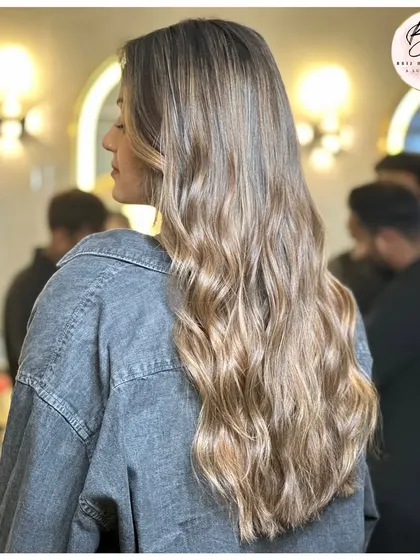 Another angle of the head-turning ash blonde, a perfect mix of confidence and style.