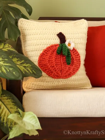 A simple, clean shot of the pumpkin cushion. Its texture and design speak for themselves.