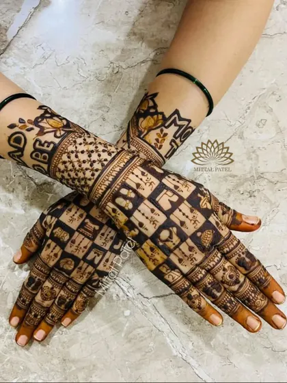 The back of the hands for a baby shower, featuring "Mom to be" and "Dad to be" text. The design is a modern grid filled with tiny, cute baby related symbols.
