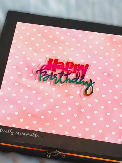 A top-down view of the pink heart-patterned birthday box, ready to be filled with memorable gifts.