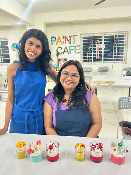 A mother and daughter enjoying their time together at our candle making workshop, with their finished creations ready to take home.
