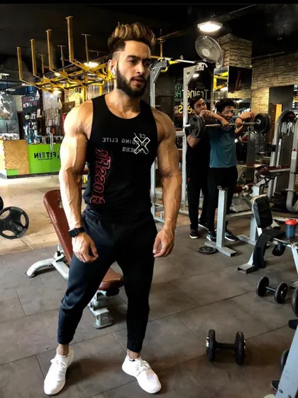 Fear kills more dreams than failure ever will. This is me in my element, surrounded by the tools of transformation. Your physique is a reflection of your will.