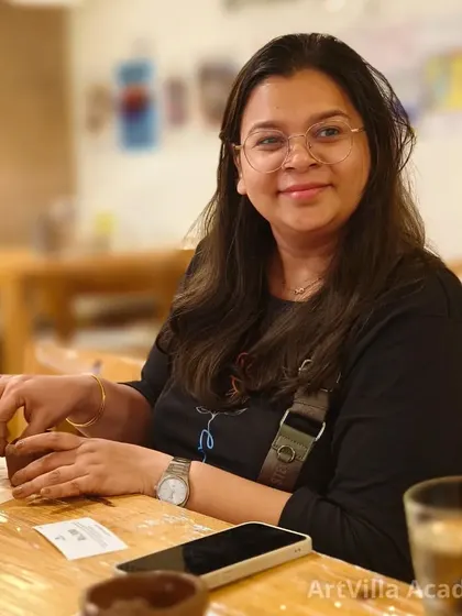 A participant focuses on her hand-building project during a workshop held at a local cafe. We often host events at different venues to bring the art of pottery to more people.