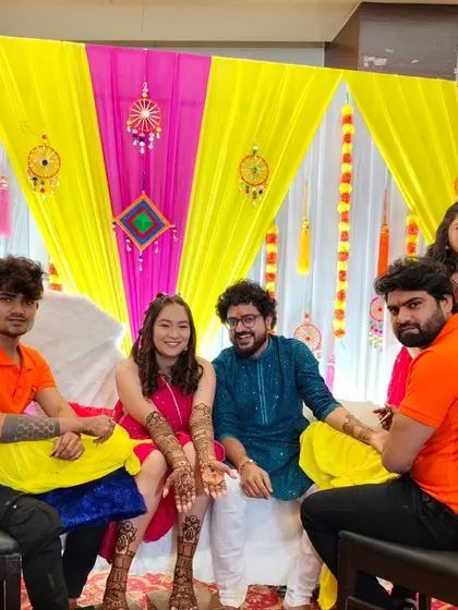Here is our team with a happy bride and groom. We come to your location and become a part of your celebration, ensuring the mehandi ceremony is smooth, fun, and memorable for everyone.