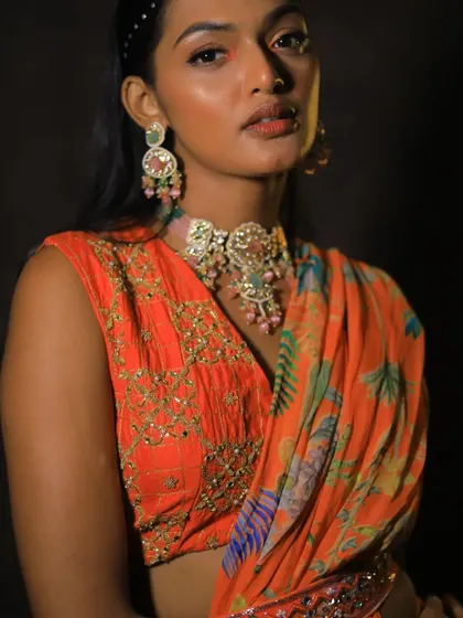 Another angle of this beautiful pastel Polki set. The intricate details and soft colors make it a versatile choice for many different festive occasions.