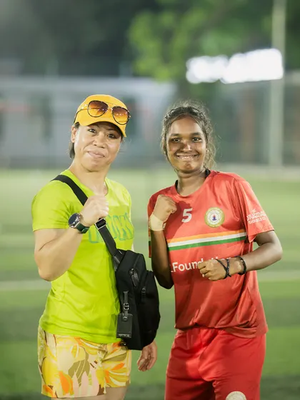 One of our female players shares a powerful moment with her idol, Mary Kom. These interactions are priceless, showing our girls that they too can reach the pinnacle of sports.