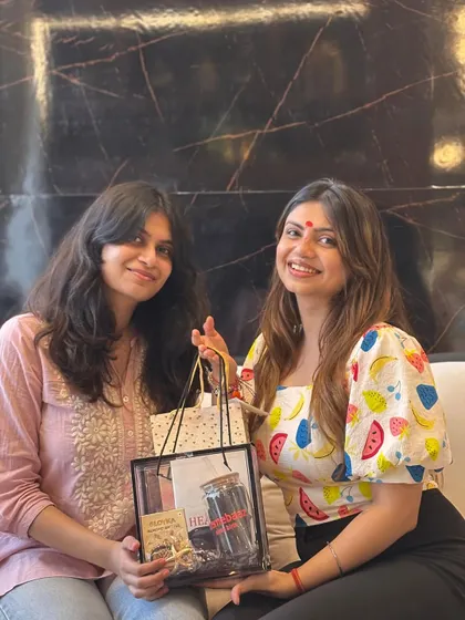 Two sisters celebrating Rakhi with a hamper I curated. Seeing my gifts bring siblings together is the best feeling.