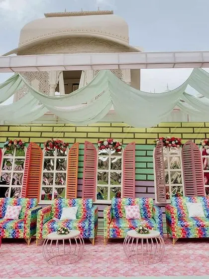 Another angle of the colorful window-paneled photo wall, a popular spot for guests at this vibrant carnival Mehendi.