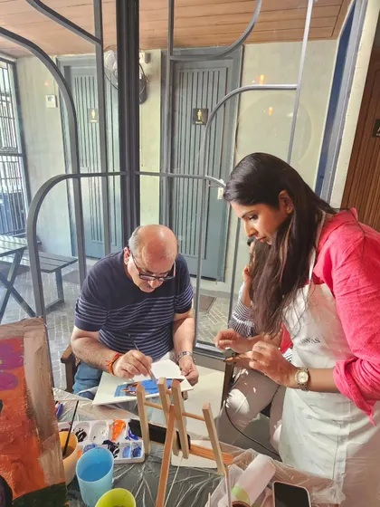 Here I am guiding a participant during a workshop. I love providing one-on-one help to ensure everyone feels comfortable and confident in their creative process.