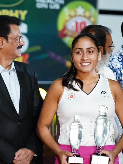 A moment of recognition for Akanksha Nitture, holding her two trophies after winning the Double Crown at the 5 Lakhs AITA Women's Open in Hyderabad.