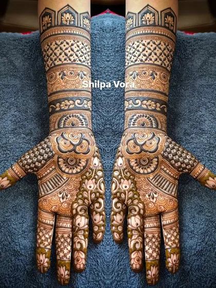 A client-chosen design that I brought to life. This full-arm piece is filled with geometric bands, floral elements, and mandalas.