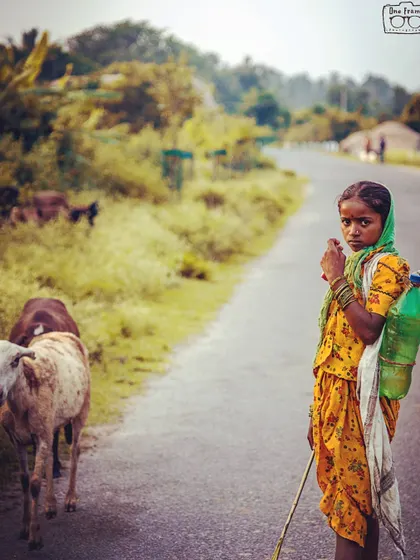 I took this portrait of a young shepherd girl on a road in Hampi. Her direct gaze is so powerful. For me, an artistic individual portrait is about capturing the soul of the person and their connection to the world around them, using natural light to tell their story.