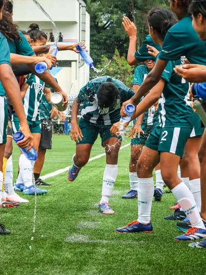 A birthday celebration done the Kickstart way! Our players drench a teammate with water, a fun tradition that shows the strong bond and camaraderie within the squad.