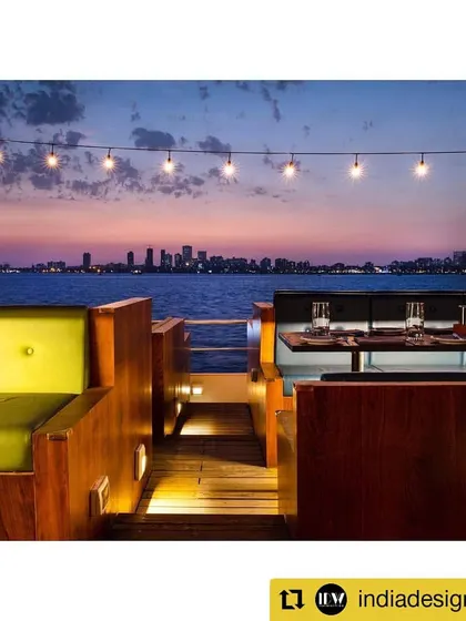 The comfortable lounge seating on the deck of the Queensline Sea Yah, positioned to offer prime views of the Mumbai skyline. We used durable, high-quality materials to withstand the marine environment while providing a luxurious experience for diners.