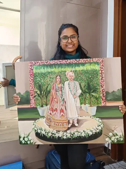 Holding up the completed painting in my studio. This piece, started at a live event in Delhi, is now fully detailed and ready to go to its new home.
