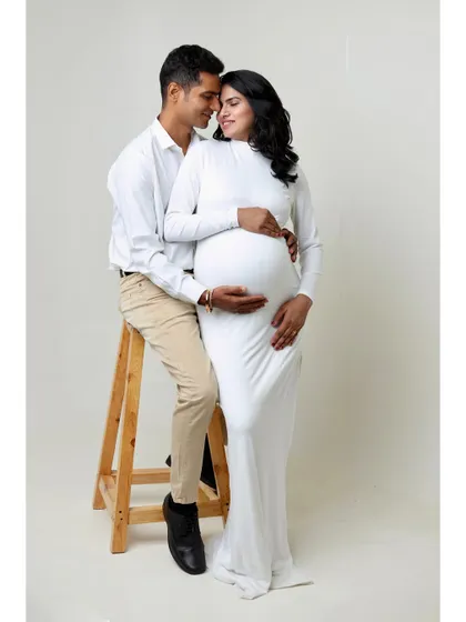 Another take on the stool pose, this time with a slightly different angle that captures the loving gaze between the couple.