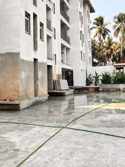 Another construction shot from the Goa project, showing the building's exterior and surrounding landscape.