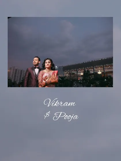 An elegant reception portrait of the couple against a dramatic evening sky, a perfect end to their wedding day.