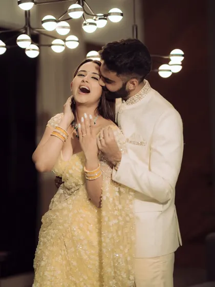 A beautiful, candid moment from an engagement shoot in Mumbai. The city provides a vibrant backdrop for any love story.