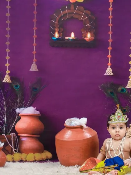 Another angle from our popular Krishna-themed shoot, ready to capture your little one's divine charm.