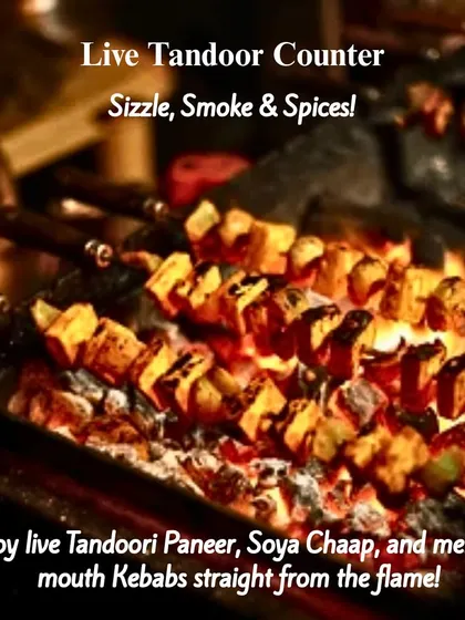 Nothing beats the aroma of a live tandoor. Watch as we grill melt-in-your-mouth Paneer Tikka, Soya Chaap, and succulent kebabs, adding a smoky and spicy highlight to your celebration.