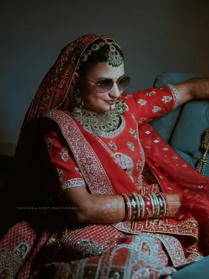 A fun, candid shot of the bride looking cool and relaxed in her sunglasses. This shows the blend of traditional and modern moments I love to capture.