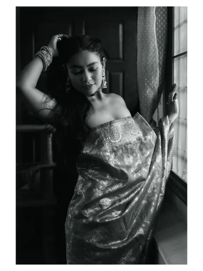 A black and white version of a beautiful ethnic portrait. The monochrome conversion adds a timeless and artistic quality to the image.