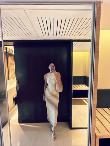 A quiet moment before a Netflix promotion event for 'Heeramandi' and 'Bollywood Wives'. This elegant, draped dress was chosen for its effortless sophistication.