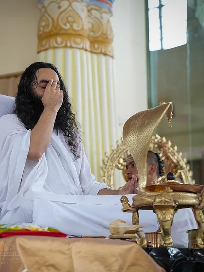 An instructor performs a part of the Rudra Puja ceremony. Our trained pandits and instructors ensure the authenticity and sanctity of these ancient rituals are maintained.