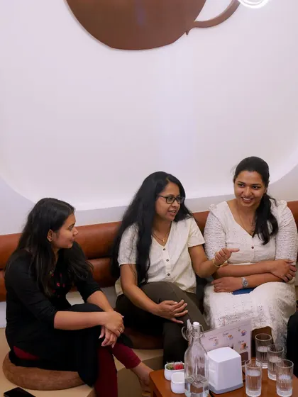 A candid moment of conversation and camaraderie among the women on our team during a company outing.