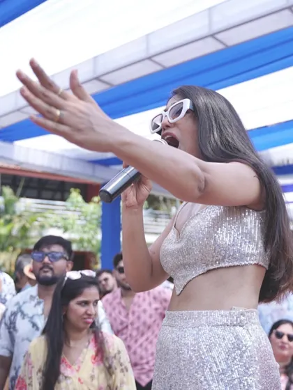 A close-up shot while hosting a wedding event. I believe in connecting with the audience personally, whether it's through a joke, a song, or just a shared dance move.