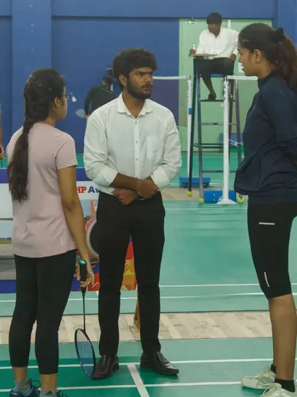A referee provides instructions to players before a match at the HPCL tournament. Our commitment to rules and officiating ensures a smooth and professional experience for all corporate participants.