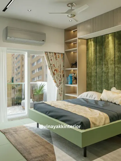Another view of this olive-green themed bedroom, showing how the design incorporates a balcony space. The floral curtains add a soft, traditional touch that complements the modern furniture.