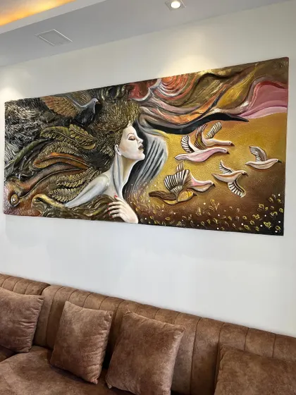 A final shot of the installed mural, capturing the full narrative of the piece, with the woman looking up towards the flock of birds.