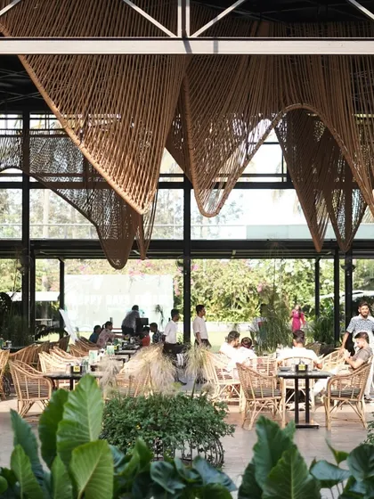 The open design of The Flame Tree zone allows for natural light and beautiful views of the garden from every table.