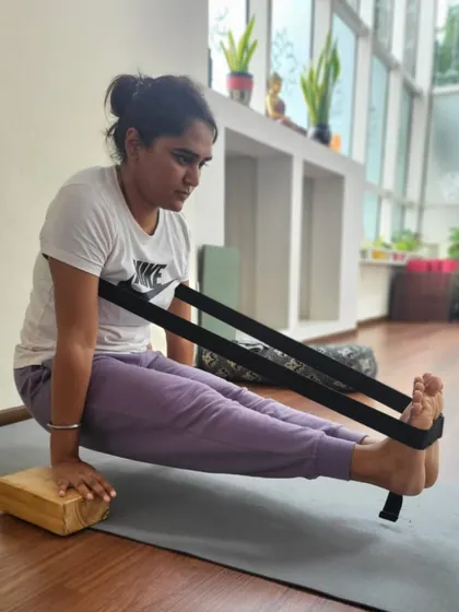This student uses a block under her hands for added height in her Brahmacharyasana practice. This small adjustment can make a significant difference in finding the leverage needed to lift the body.