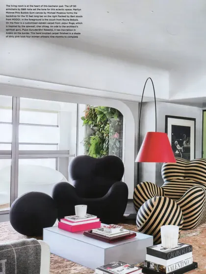 The living room of Project 86 as featured in Livingetc. The article highlights the mix of a contemporary bubble couch and a classic Up chair, creating a formal yet relaxed feel.