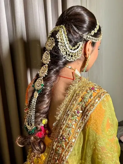A modern Kundan hair accessory, perfect for a half-up hairstyle or a messy braid for a sangeet or reception.