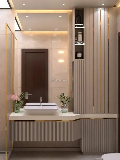 Indulge in modern elegance with this bathroom design. I used floor-to-ceiling tiles, gold-trimmed cabinetry, and a sleek vessel sink to create a space that whispers luxury in every detail.