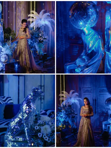 A look at the cool, retro-themed decor of the cocktail party, including a disco ball statue and a mirrored leopard.