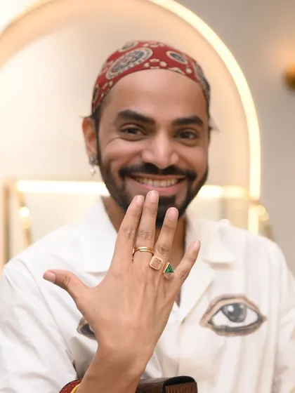 A guest showcases a selection of our designer rings. Our private viewings are the perfect opportunity to experiment with stacking and find your unique combination.
