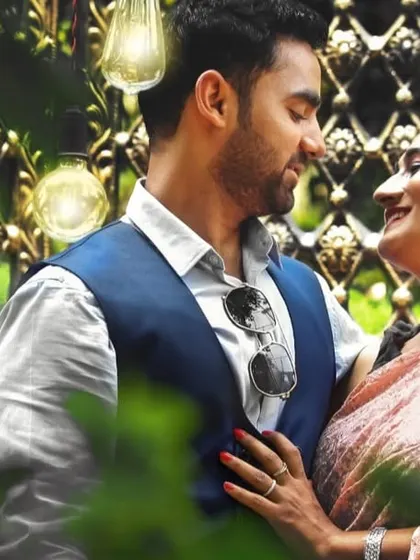 A candid photo of a couple sharing a happy, loving gaze during their pre-wedding session.