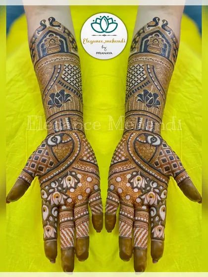 A bridal hand demo created for one of my classes, featuring swans, lotuses, and a variety of intricate filler patterns.