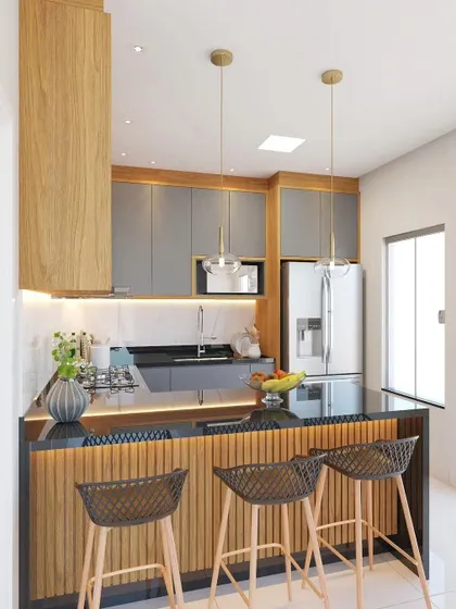 Another angle of the grey kitchen, focusing on the breakfast counter with stylish bar stools and fluted wood paneling.