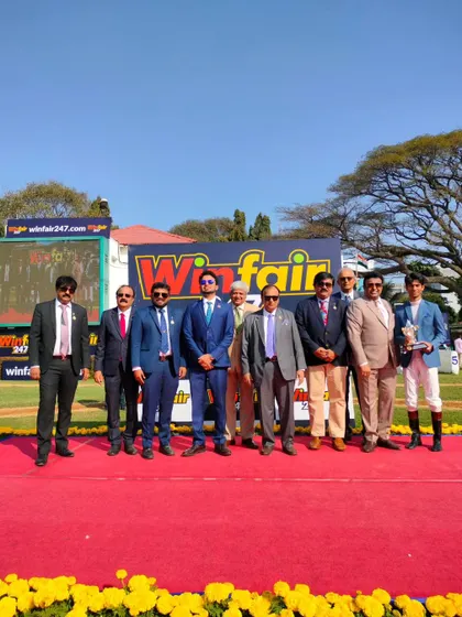 The presentation ceremony for The Indian Republic Trophy with the winning team of Tripitaka.