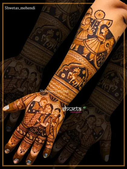 Your mehendi can be a family portrait. This custom design captures a special family moment on the hand, showing how we can personalize your bridal mehendi to be truly one of a kind.